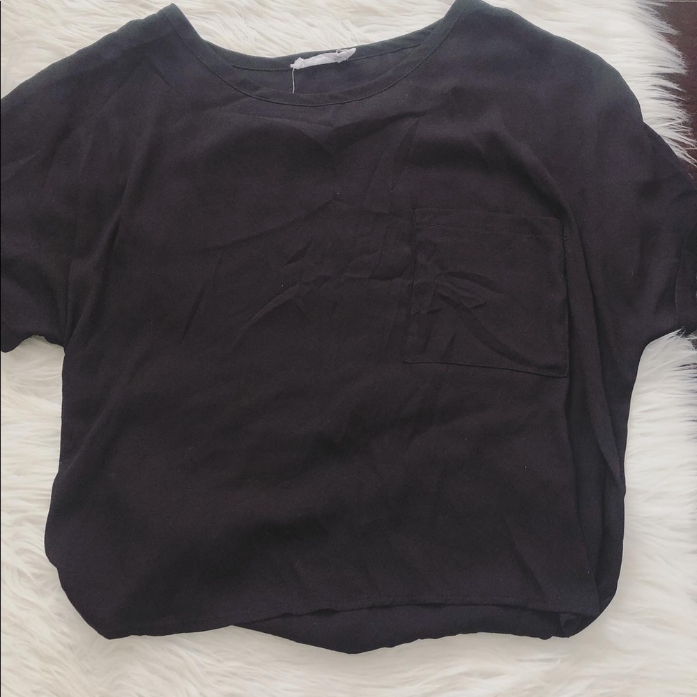 mesh shirk, it is black! with one pocket on side